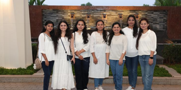 A group of women posing for a photo