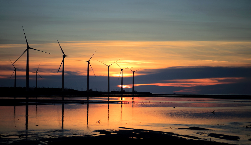 8 windmills on the beach