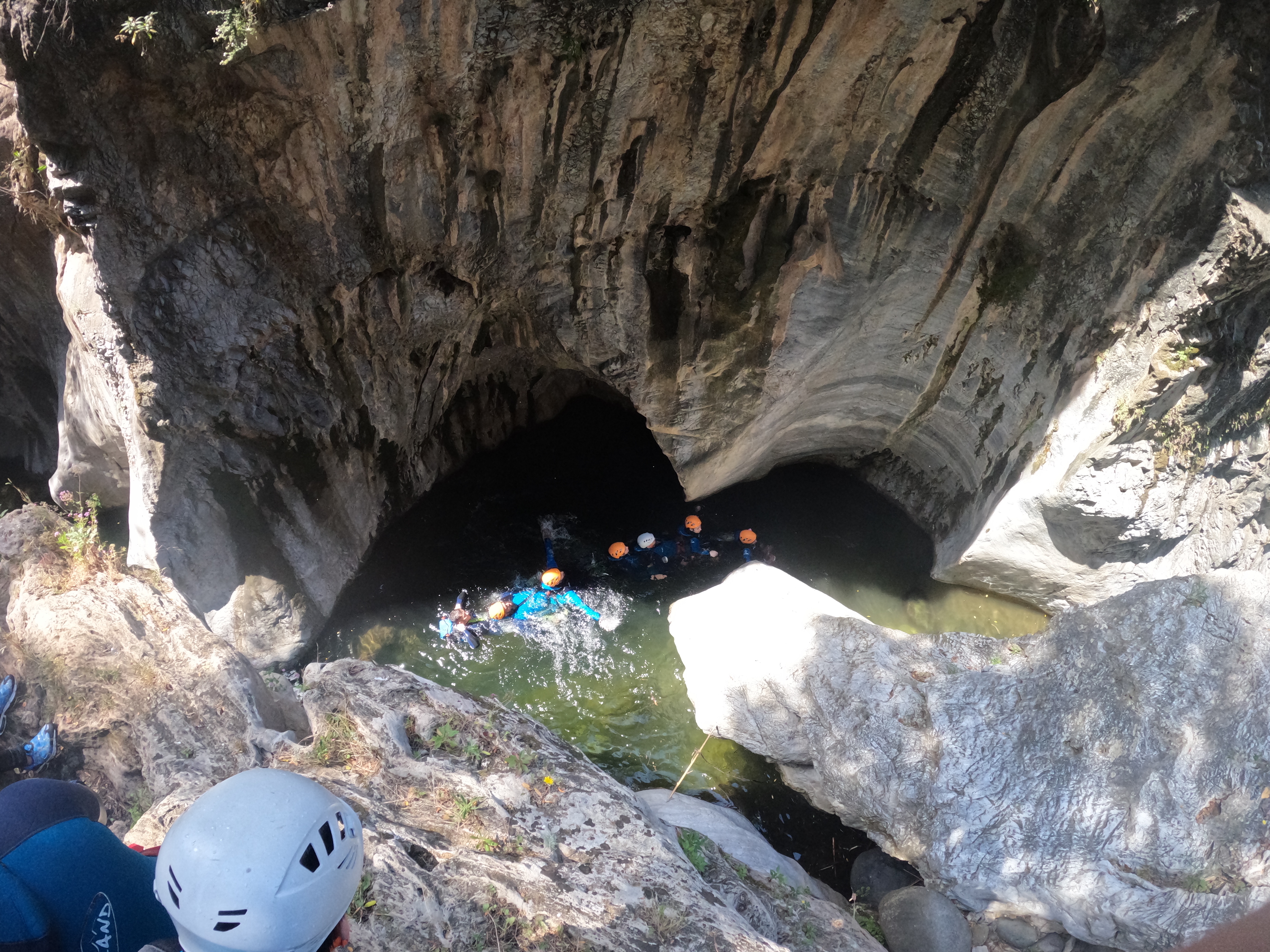 Abstract Group staff canyoning