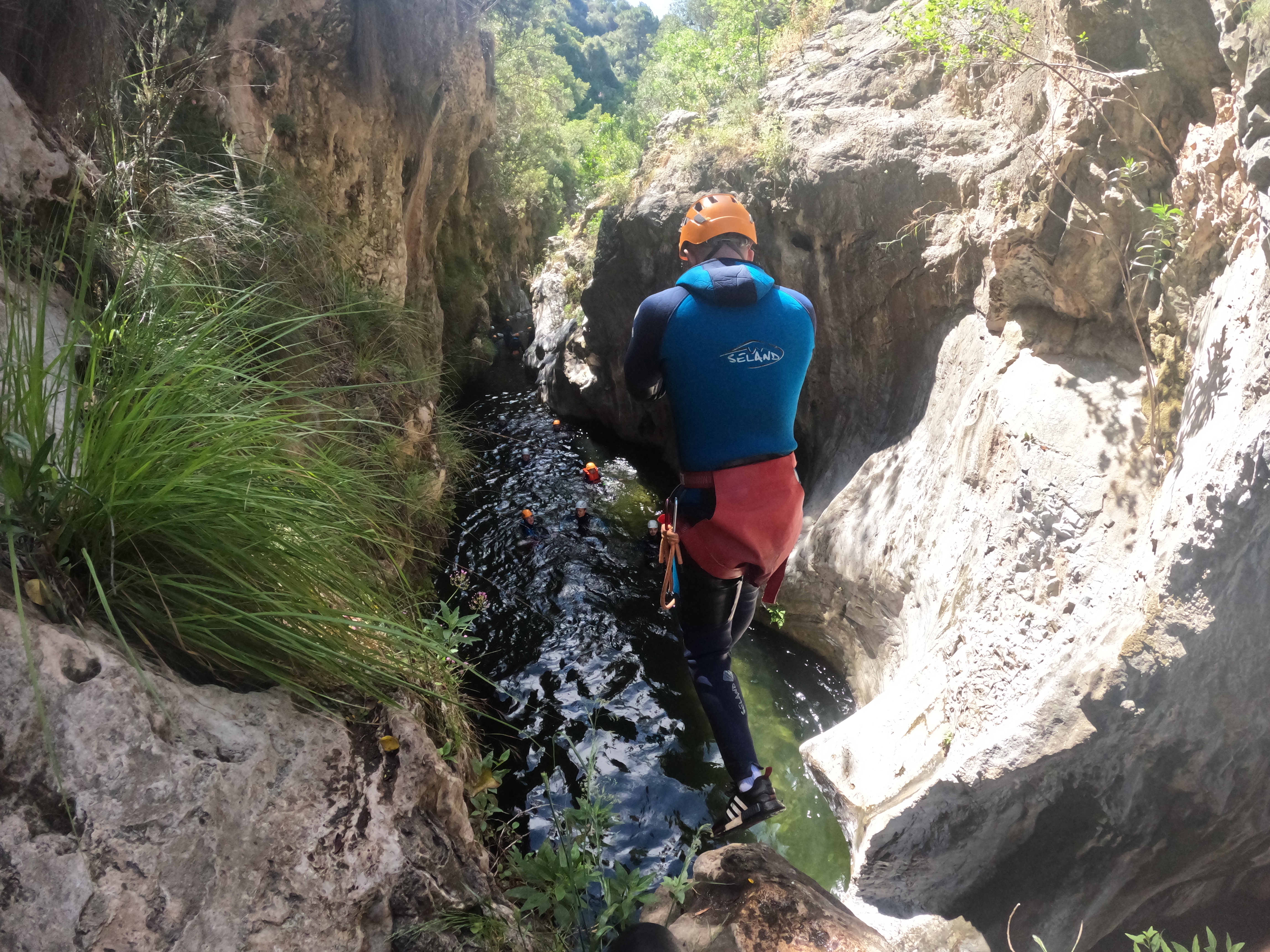 Dawid jumping into the water