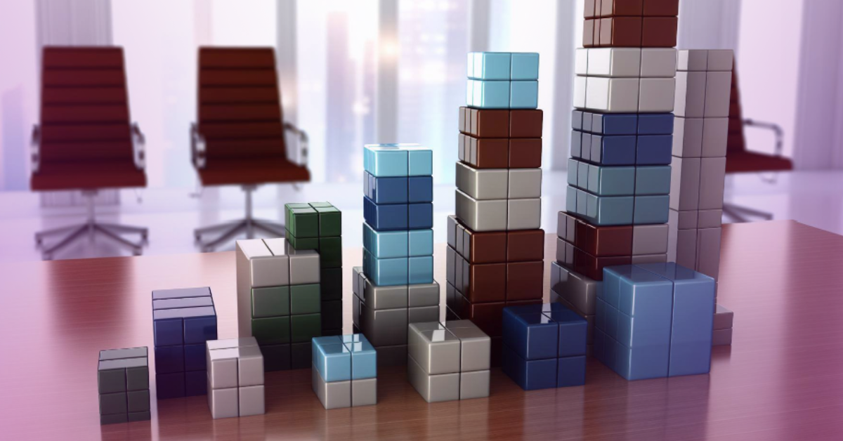 building blocks on a boardroom table representing building a non-executive board post investment 