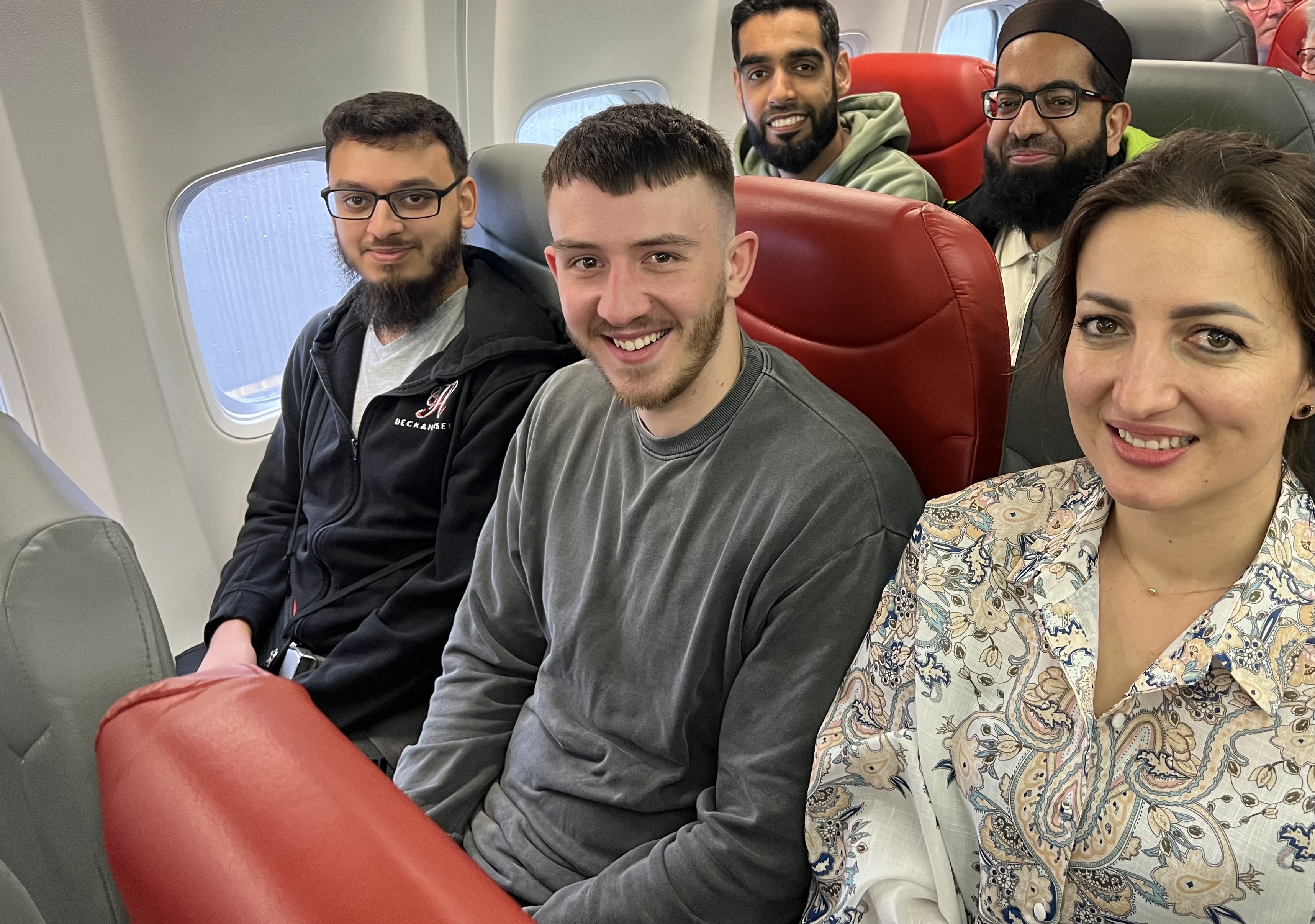 Abstract Group staff on the aeroplane to Marbella 