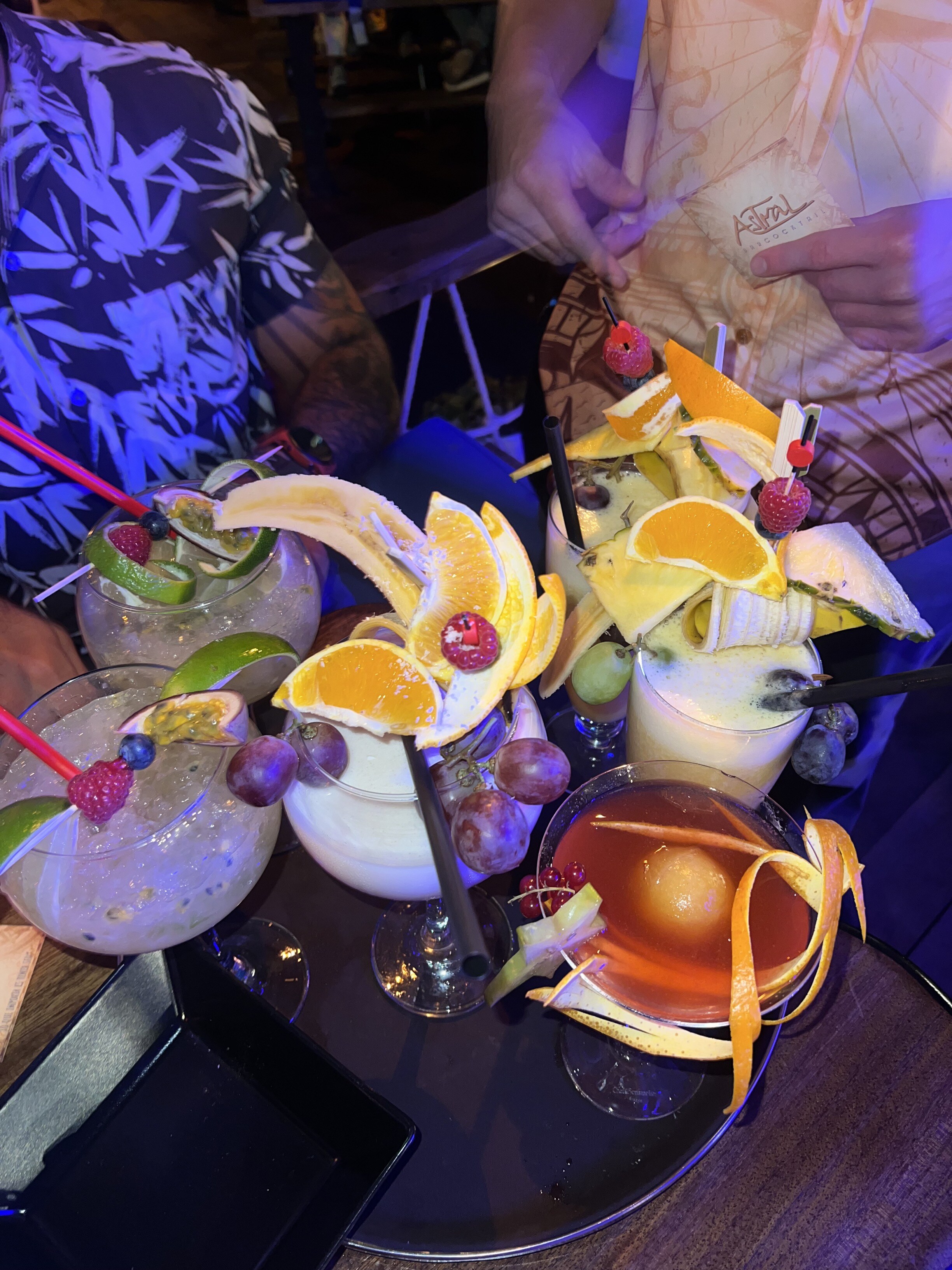 Cocktails with fruit attached 