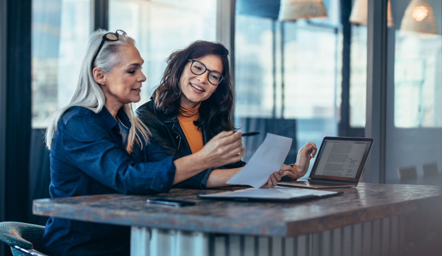 2 women discussing private equity and talent research 