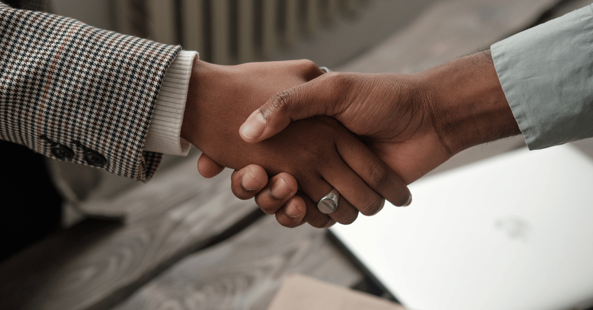 Two people shaking hands 