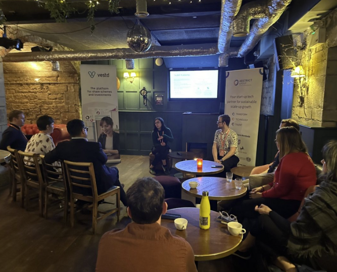 Emily Wells and Liam Sanders presenting a workshop