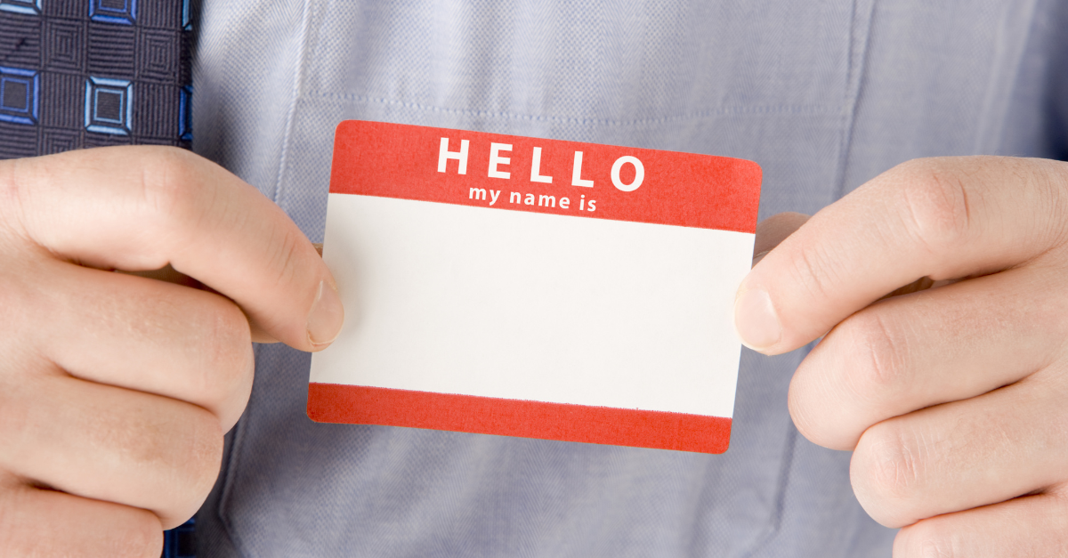 A person holding an introduction card